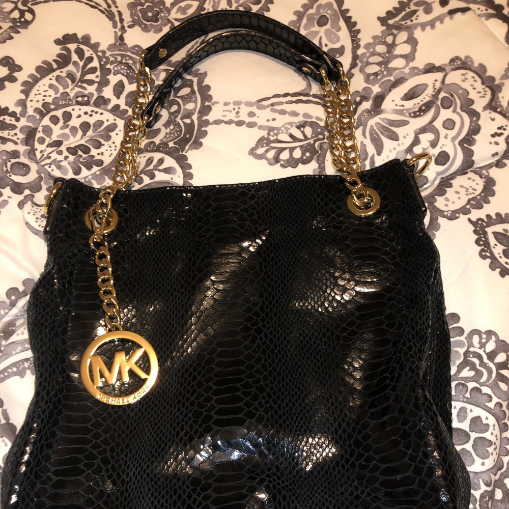 Never used Michael Kors snake skin purse